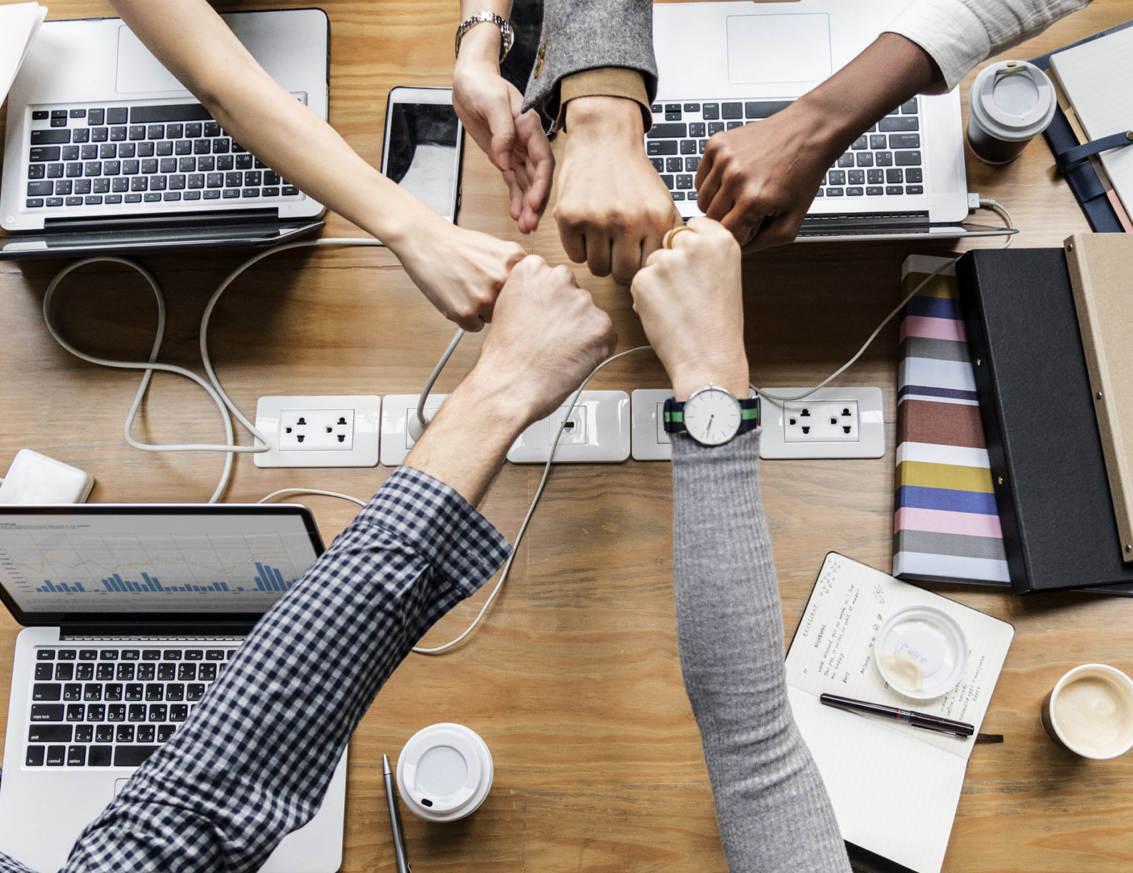 Colleagues giving a fist bump